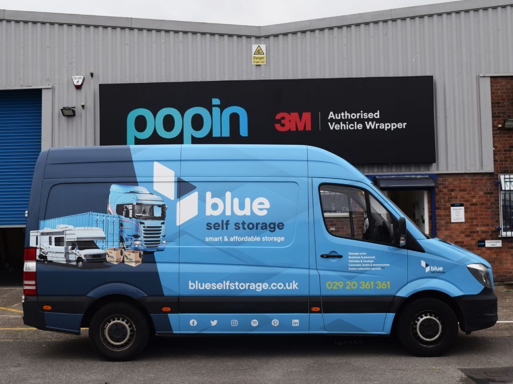 Blue Self Storage van wrap on Mercedes Sprinter outside Popin in Cardiff.