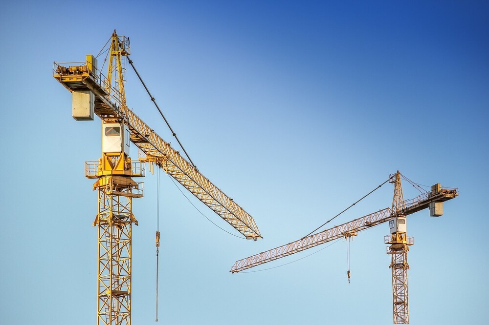 What are the key stages in a construction site survey?