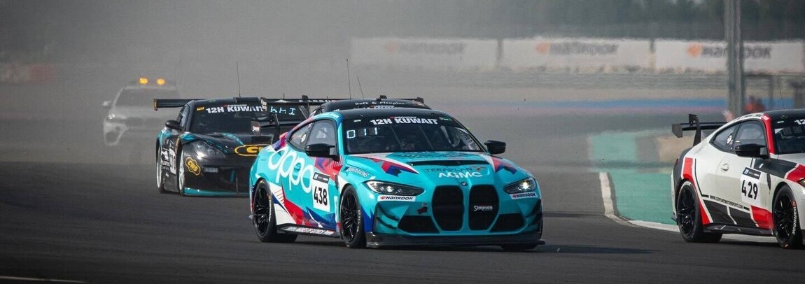 Bold motorsport livery design with sponsor branding on a race car during a racing event.