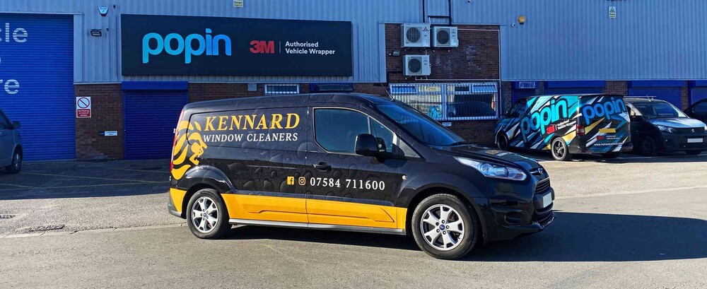 Professional tradesman van wrap for local window cleaning business branding outside Popin in Cardiff.