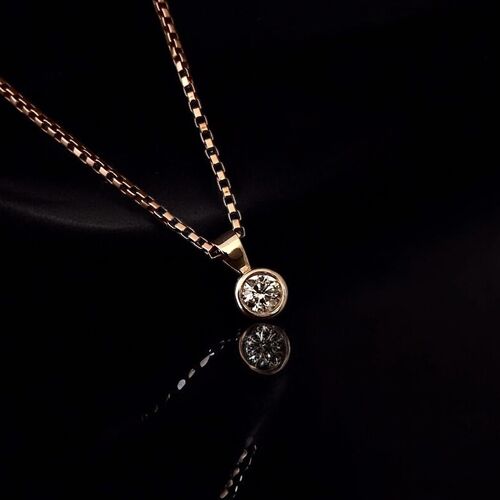 Rubover diamond solitaire pendant in 9ct yellow gold
