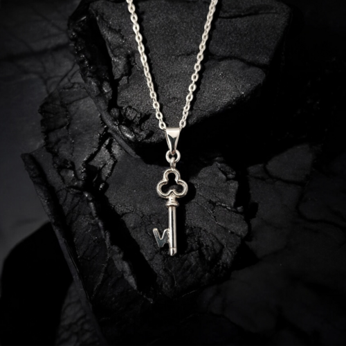 Mini silver key pendant 