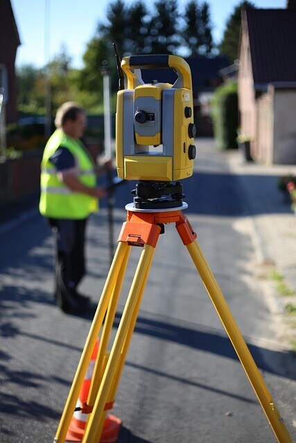 What are the advantages of using laser scanning for surveys?