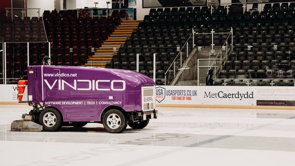 Zamboni ice resurfacing machine with purple wrap