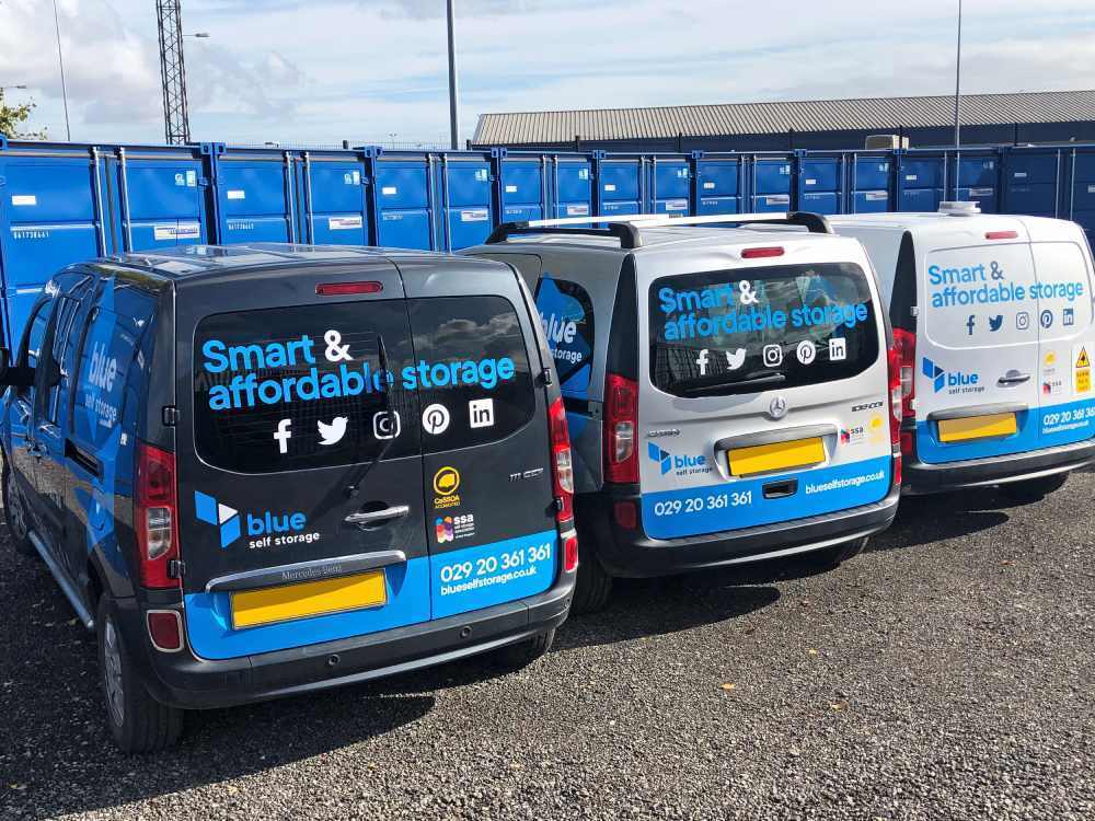 Blue Self Storage Mercedes Citan vans with company branded vinyl graphics and window decals.