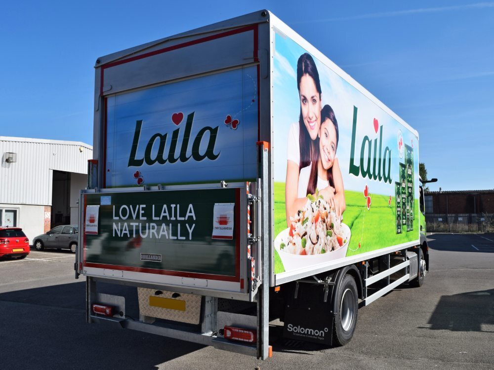 Branded vehicle vinyl wrap on a company Mercedes truck.