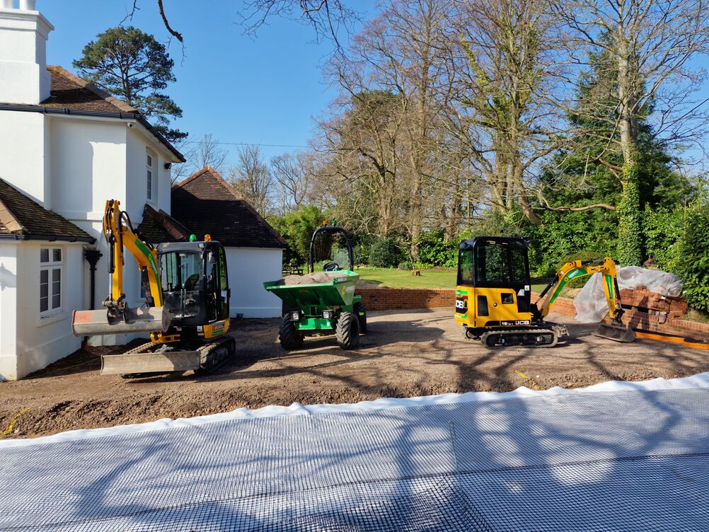 150 metre Boundary Brickwork Wall and 285 sqm Block Paving. Special piling and steelwork design provisions taken to protect TPO tree roots.