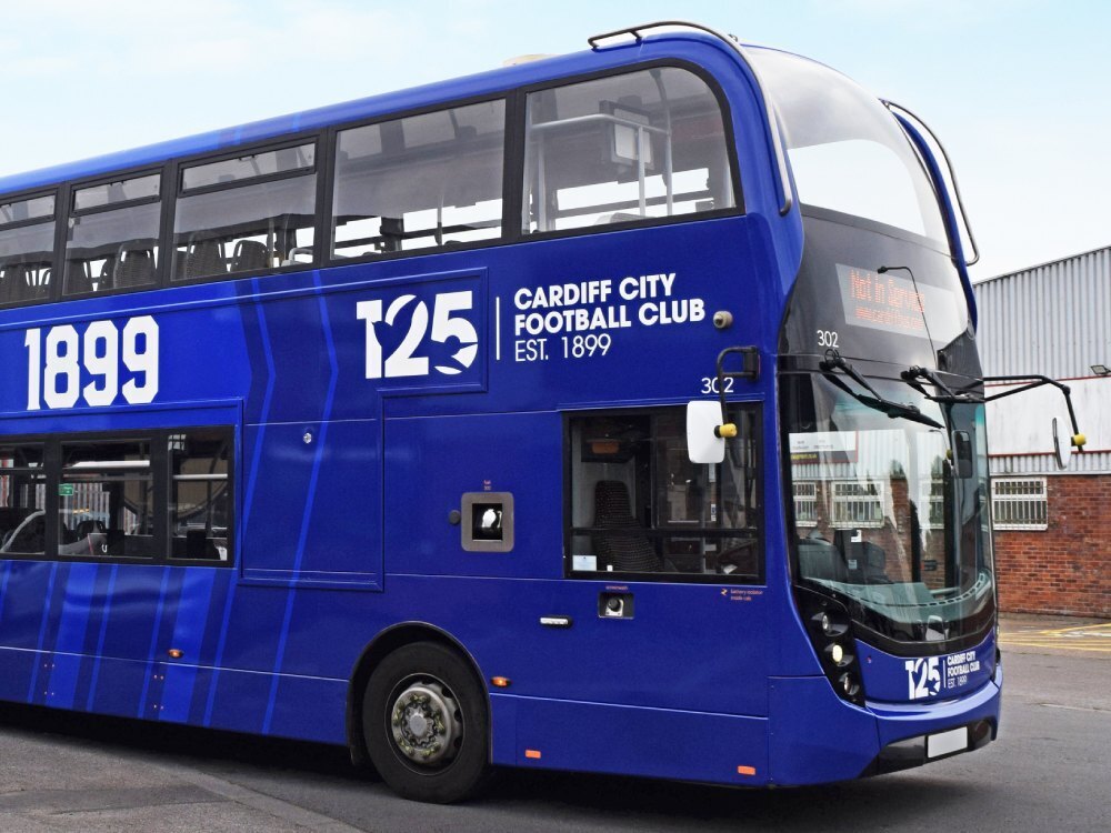 Blue Cardiff City FC vehicle livery on Alexander Dennis Enviro 400 double decker bus.
