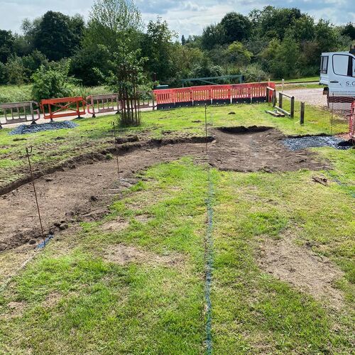 Photo showing next stage of work. Path being dug out.