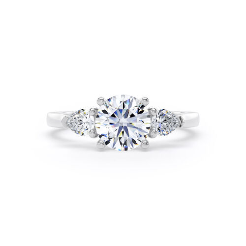 Round and pear diamond trilogy ring