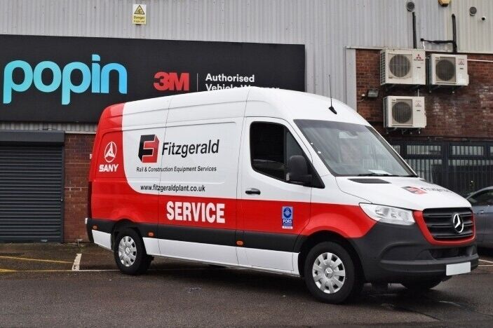 Mercedes Sprinter van with company branded partial vehicle wrap and vinyl graphics outside Popin in Cardiff.