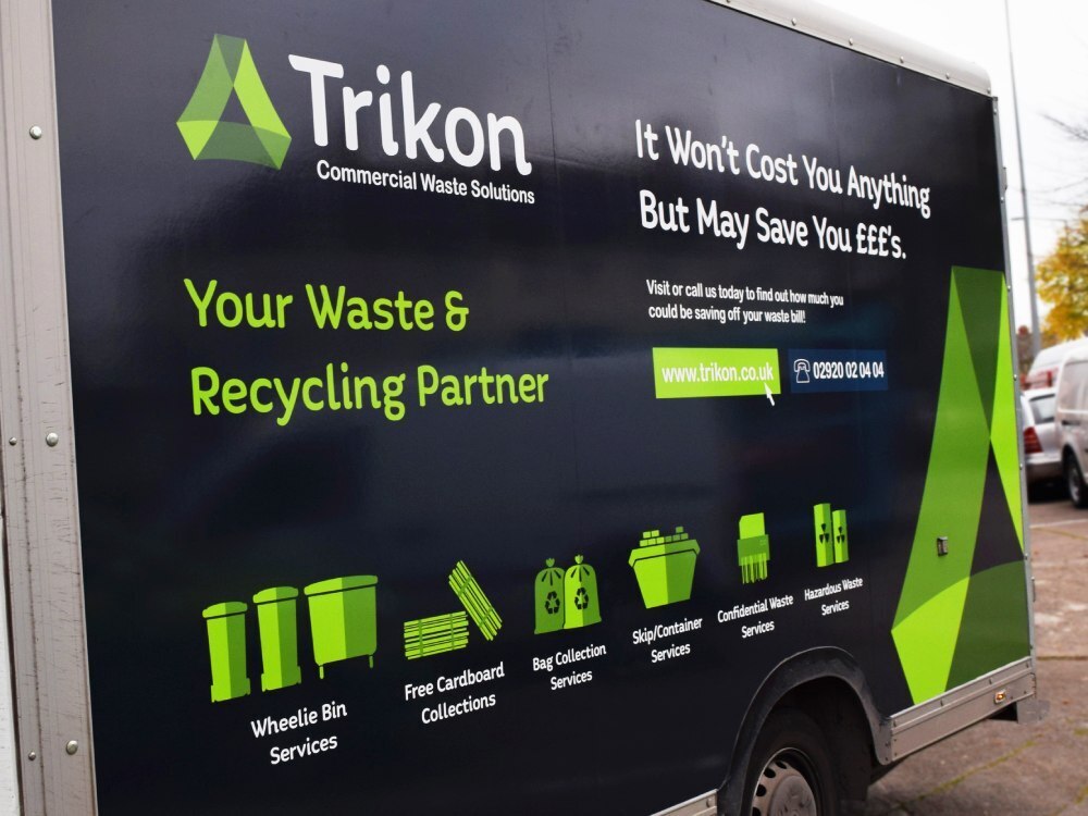 Close up of branded van wrap on company Renault Master.