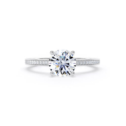 Round brilliant solitaire with straight diamond set shoulders
