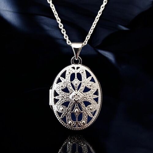 Diamond set filigree locket