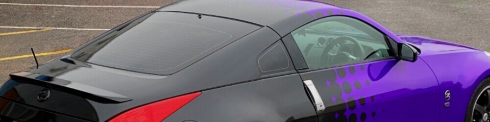 Close up of wrapped sports car rear and side windows showing legal visibility compliance.