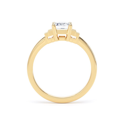 Emerald and baguette diamond ring