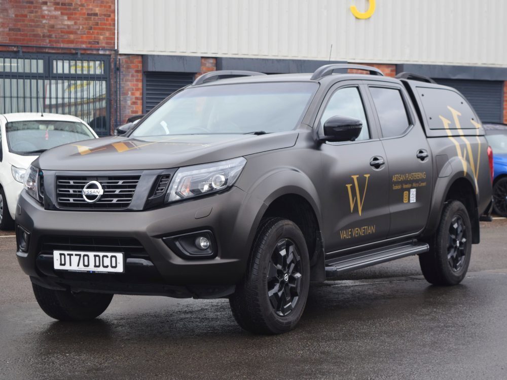 Nissan Navara double cab with gold Vale Venetian company branded vinyl graphics.