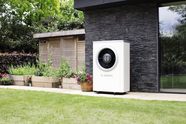 Are there any maintenance tasks I should perform on my heat pump to ensure it operates efficiently in hot weather?