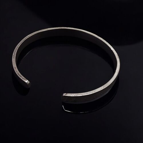 Sterling silver cuff bangle with diamond-cut detailing 