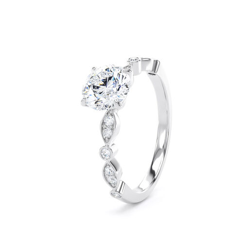 Round brilliant solitaire with fancy shaped shoulders