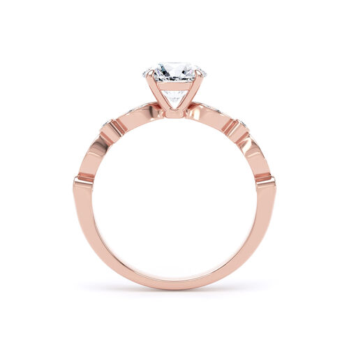 Round brilliant solitaire with fancy shaped shoulders