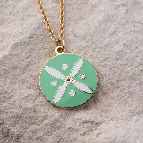 Round Pendant. The Persian Cross. White on Torquoise Green with 1 Central Red Stone.