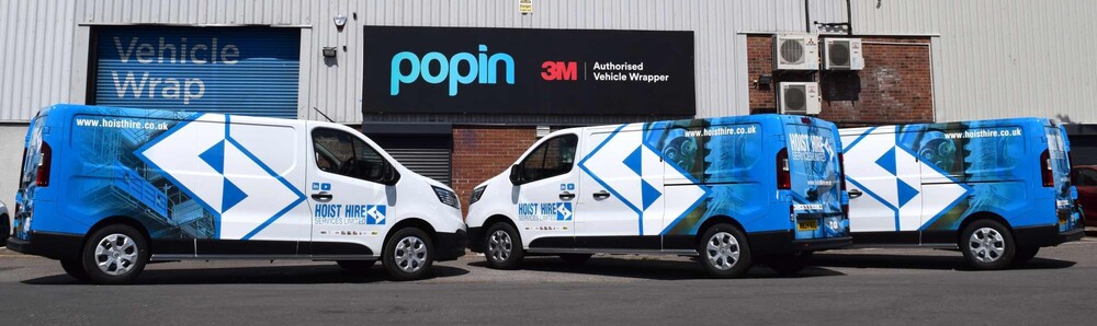 Branded fleet vans prepared and professionally wrapped at Popin in Cardiff after bodywork repairs.
