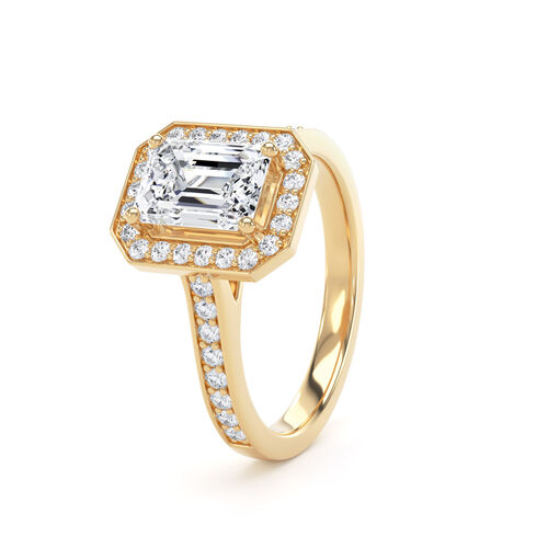 Emerald cut halo with channel borders