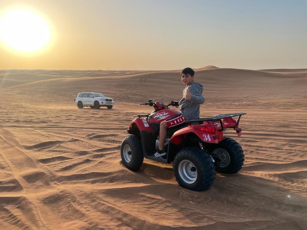Evening Red Dune Desert Safari with Quad Bike | Desert Tigers Tourism L.L.C | Dubai Safari 4x4 Tour Packages | Dubai Safari Quad Bike Tours | Dubai City Tours Camel Rides