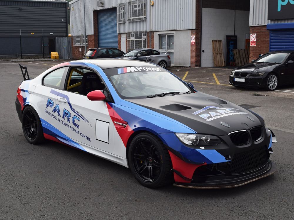 Company branded car wrap and vinyl graphics on BMW M3.