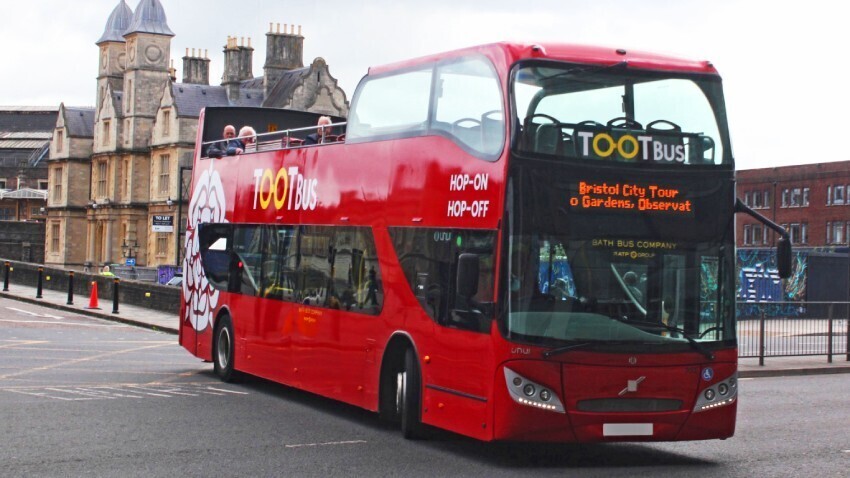Red UNVI Urbis Bristol open top tour bus with Tootbus branded vinyl graphics.