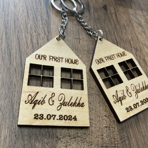 “New Home” keyring pair