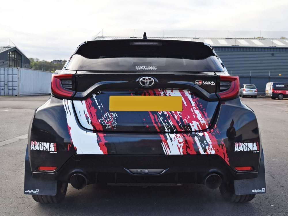 Rear of Toyota Yaris GR company car with branded vehicle wrap and graphics.