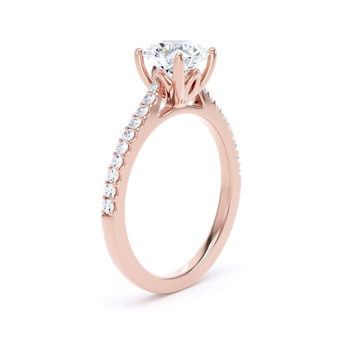 Round brilliant solitaire with diamond set shoulders