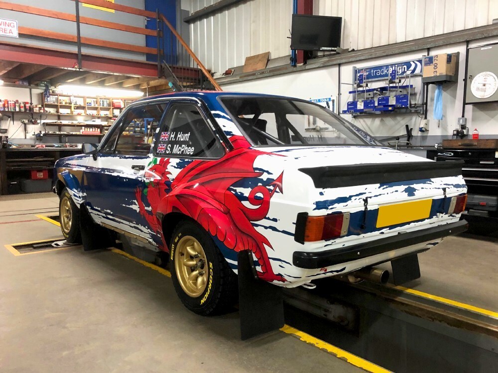 Red dragon graphic on a Ford Escort MK2 rally race car