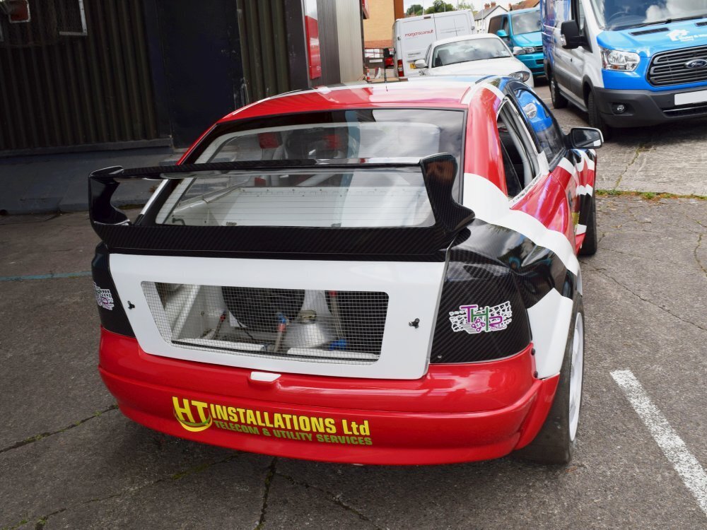 Motorsport livery and graphics on rear end of Vauxhall Astra race car