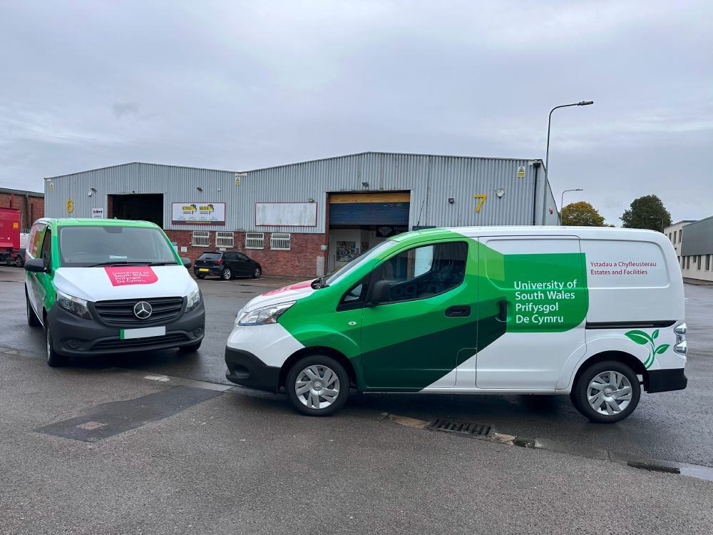 Nissan e-NV200 fleet with matching University of South Wales branded partial vehicle wraps.