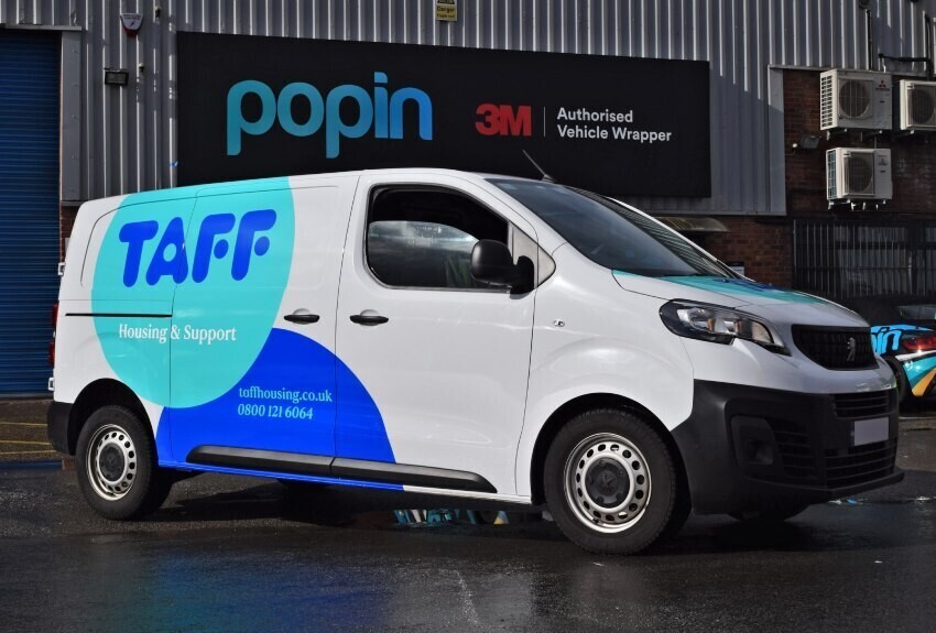 Company van with clear and easy to read branded vehicle graphics.