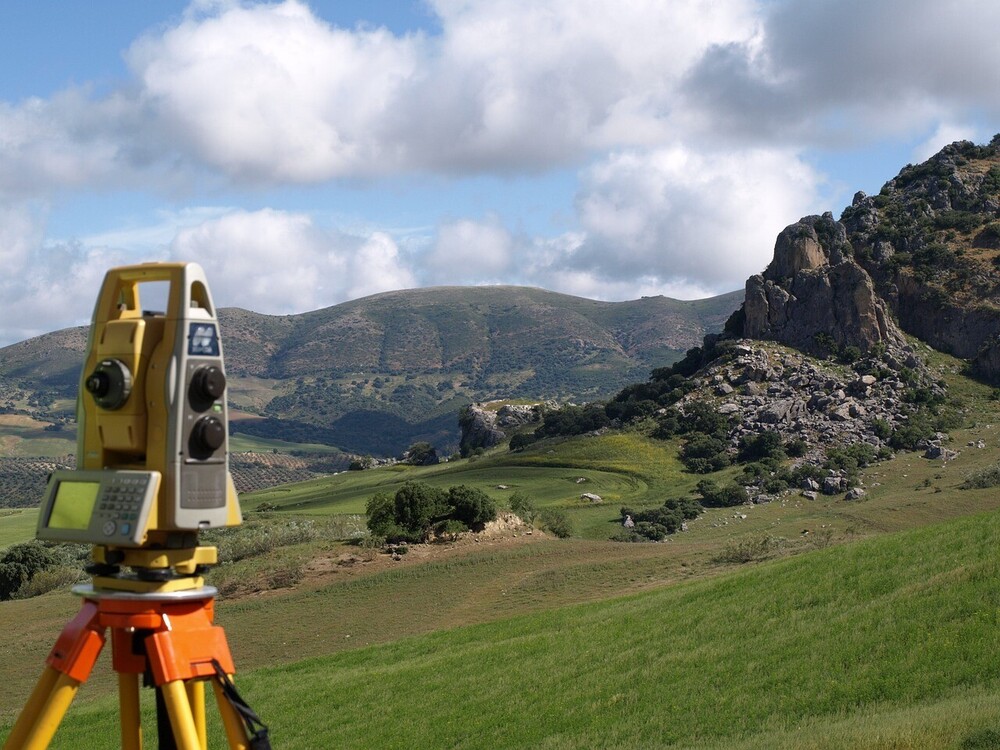 How do topographical surveys benefit construction projects?