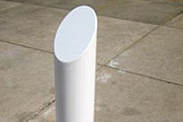 Slanted top bolt down bollard