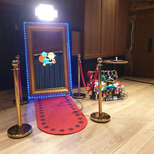 Magic Mirror Photo Booth with red carpet and props