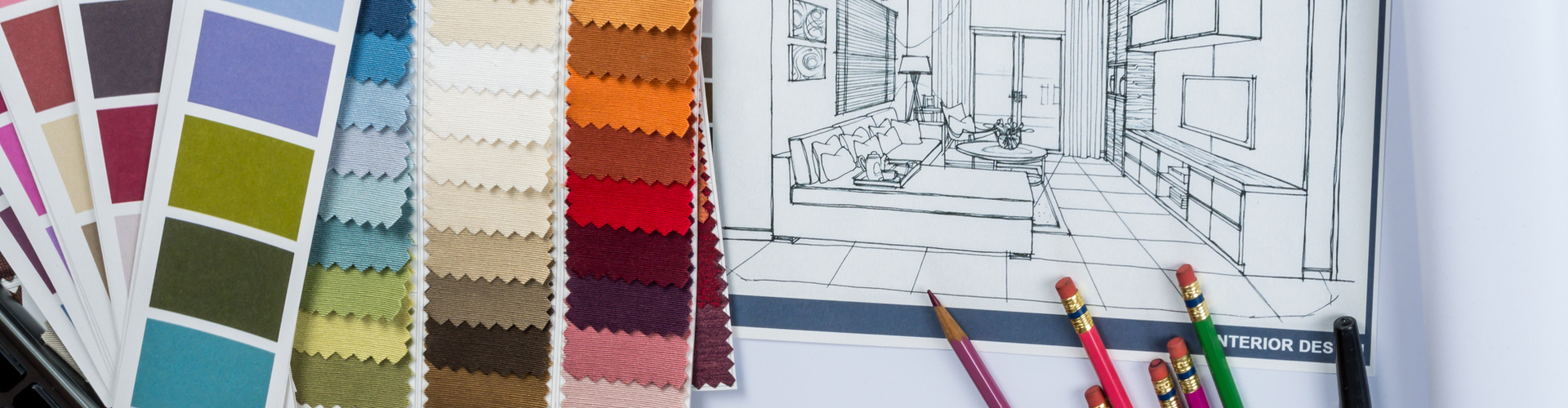 A picture of colour swatches and drawings, as used in the design process by Catherine Brennan, Home Interior Designer of New Forest Designs. Catherine provides services such as Handmade Curtains, Bespoke Blinds, Upholstery, Interior Design and Magic Touch