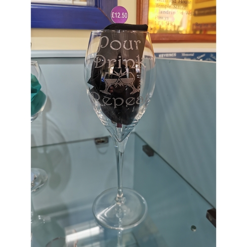Engraved Wine glass "Pour drink repeat"