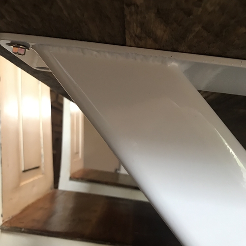 White metal cross leg table and bench