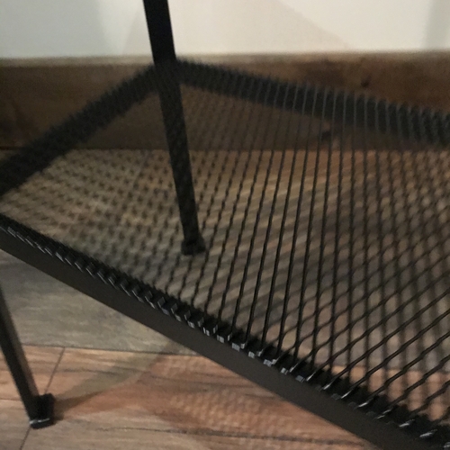 Small copper top table with black painted legs