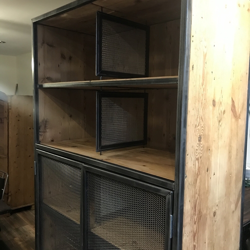 Large industrial metal mesh cupboard