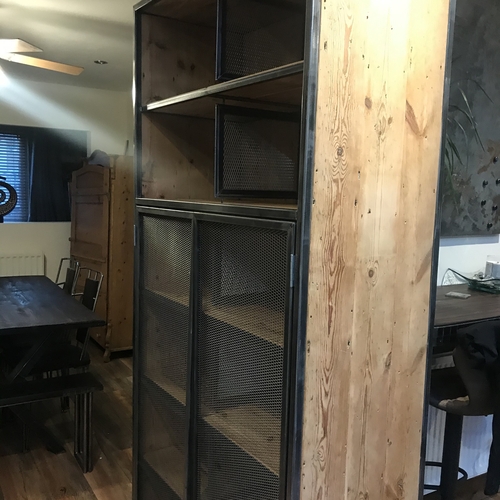 Large industrial metal mesh cupboard