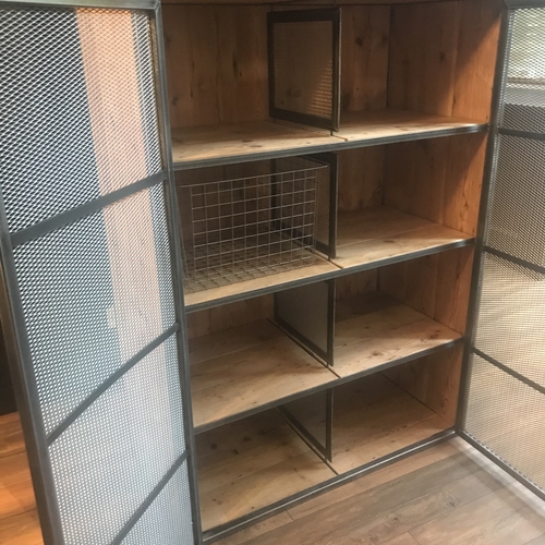 Large industrial metal mesh cupboard