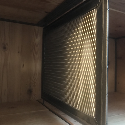 Large industrial metal mesh cupboard