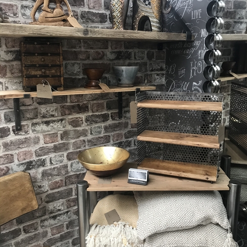 Small reclaimed shelves with perforated mesh design detail